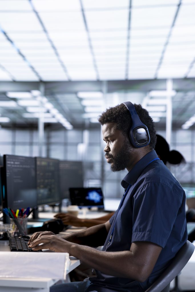 it professional working to ensure data center gear operates efficiently